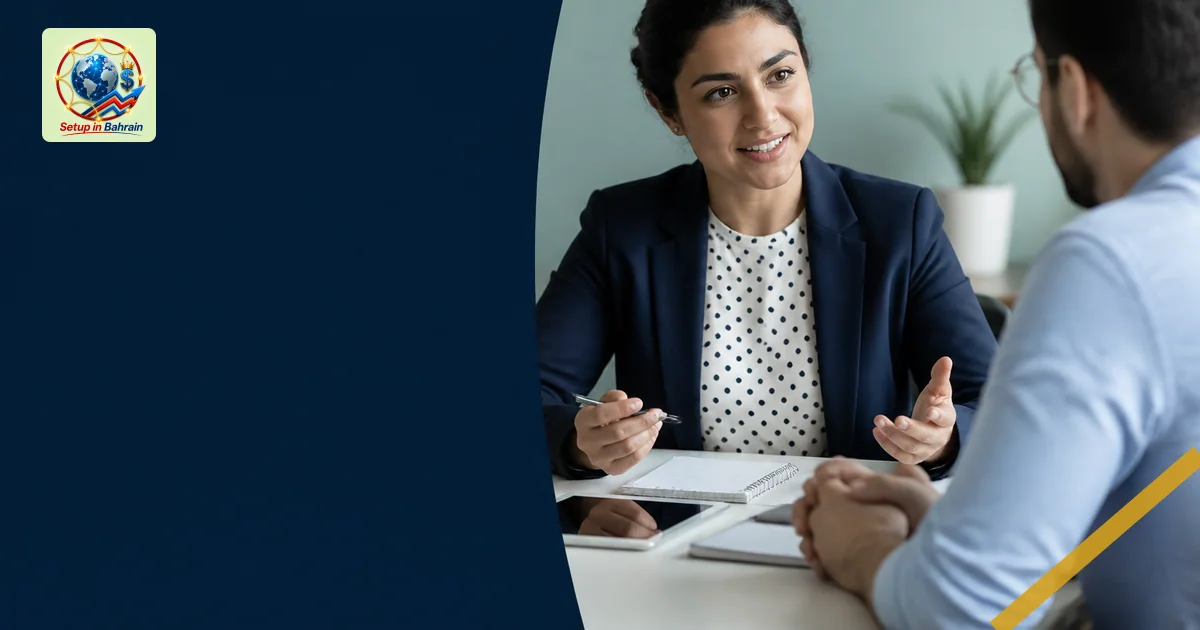 A professional office scene shows a financial planner and client seated across a tidy desk, discussing personalized guidance.