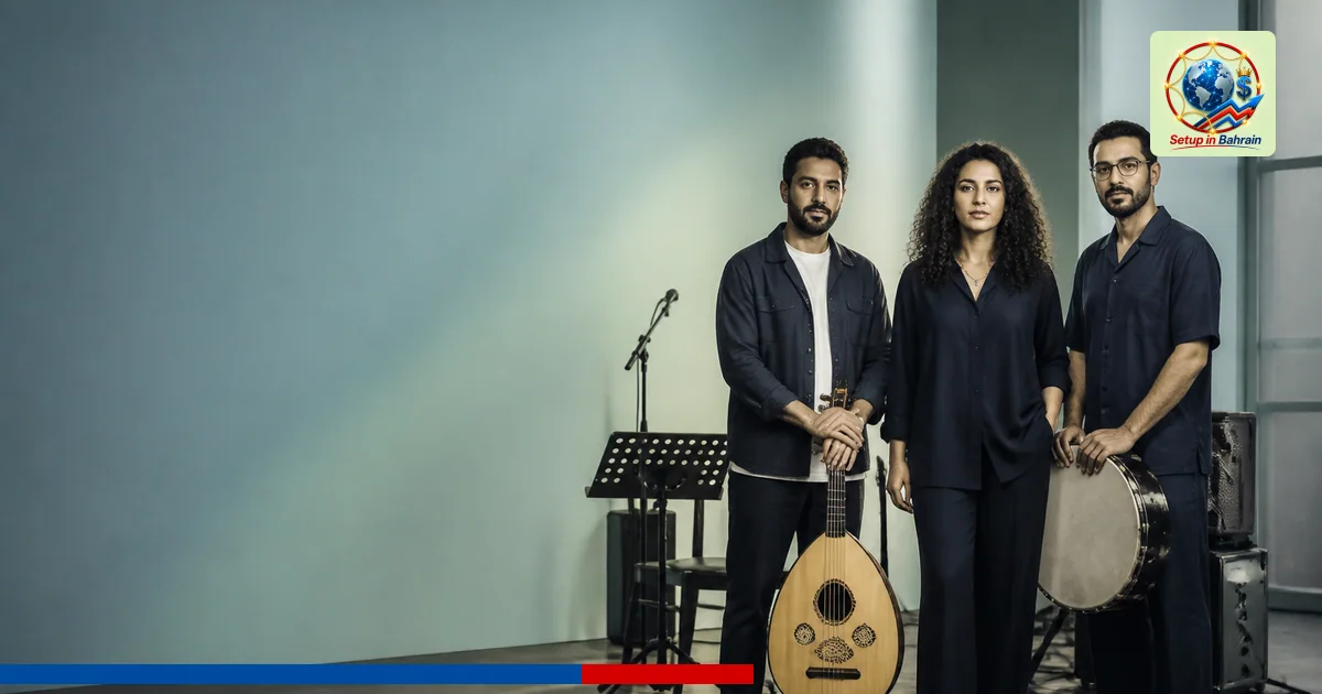 Three musicians stand together in a professional rehearsal space with instruments and microphones, calm and collaborative moo