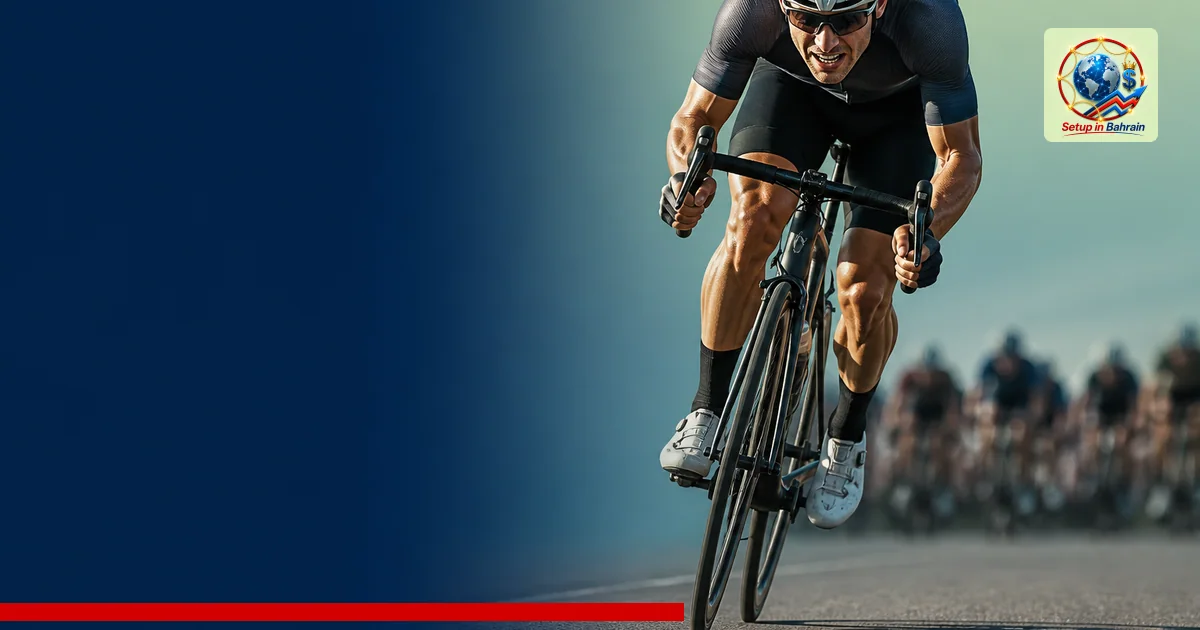 A single professional cyclist in mid-sprint pose on a clean road, with a blurred background suggesting a race; a navy-edged l