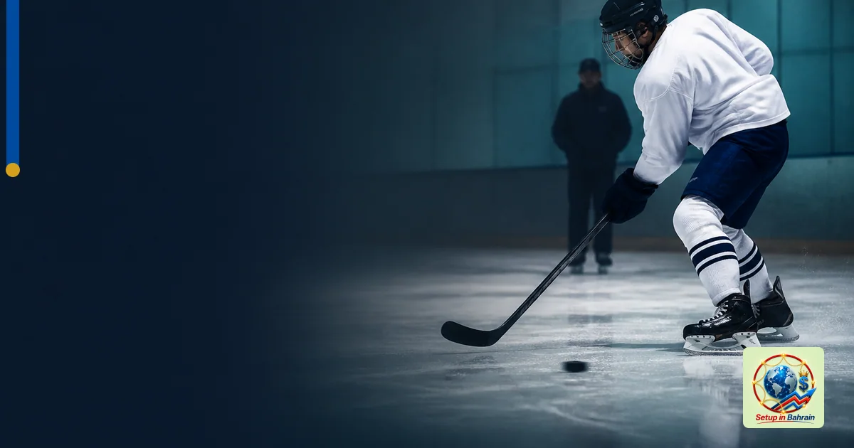 A focused hockey prospect drills in an NHL training facility with a coach observing in the background. The scene emphasizes m