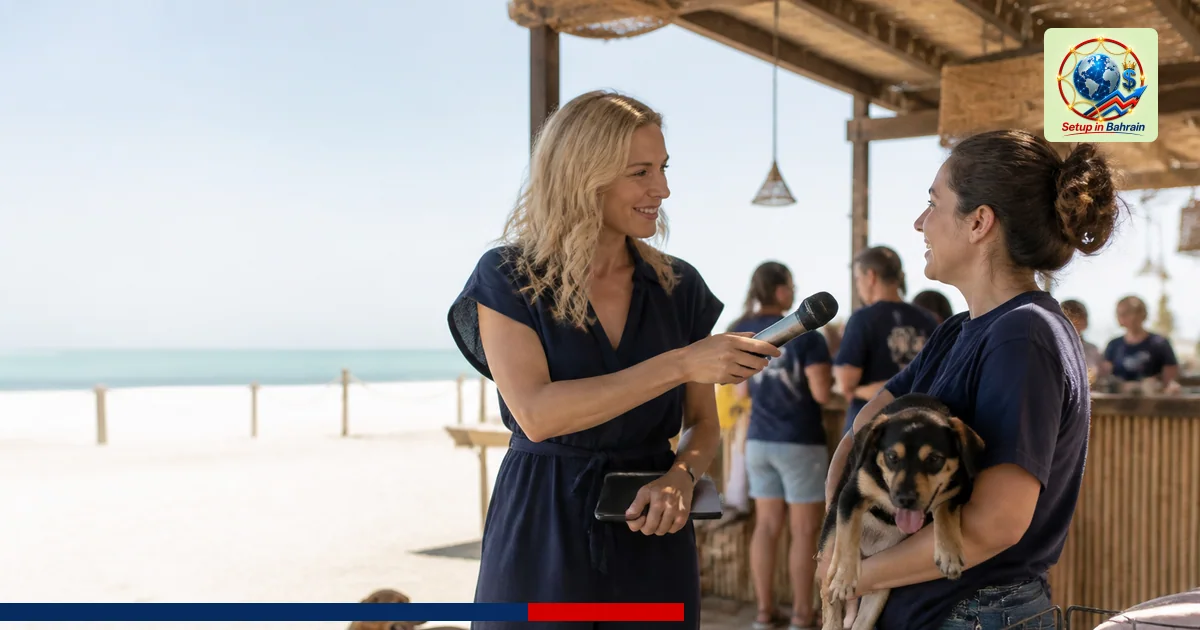 Editorial-style photo of a volunteer host at a beachside charity event with a dog nearby, soft natural light, calm sea in the
