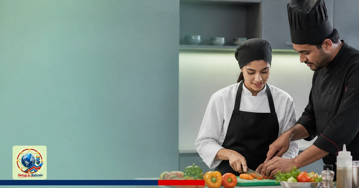 A contemporary hospitality training scene: a young trainee works with a mentor in a clean, modern kitchen; the left side show