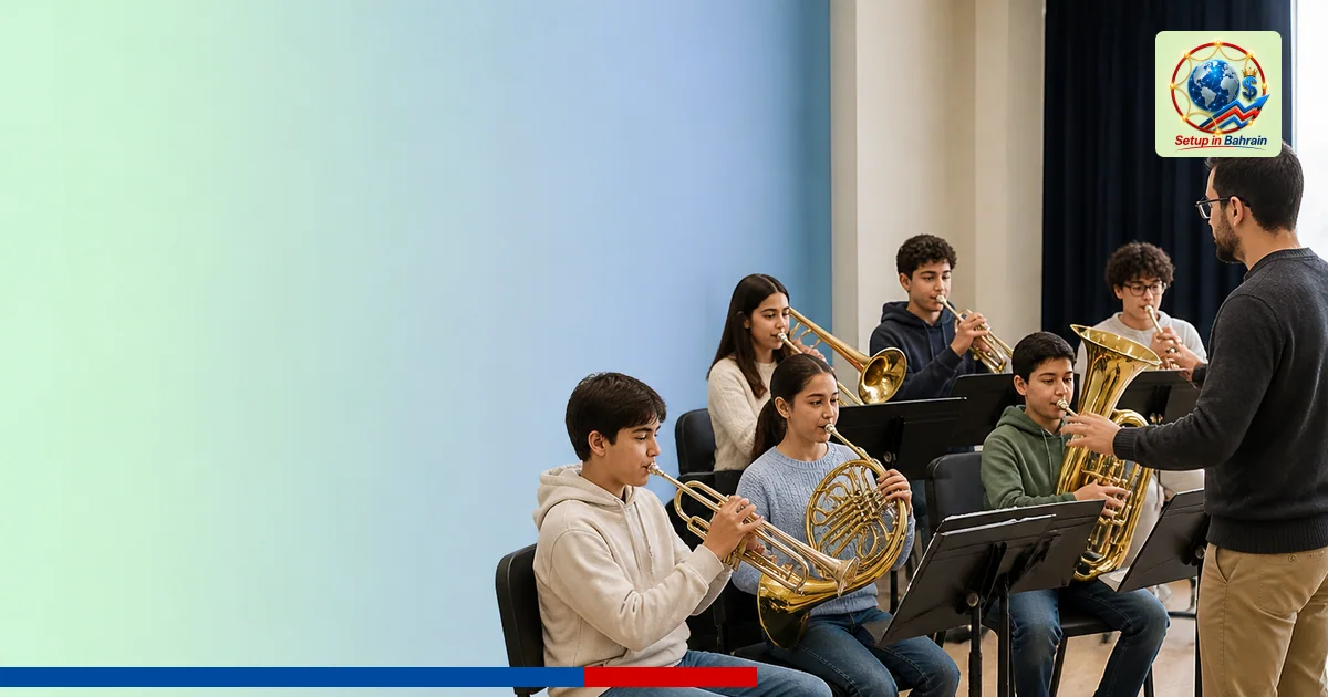 A group of six youths with brass instruments rehearsing in a bright community room, guided by an instructor. The left side ha