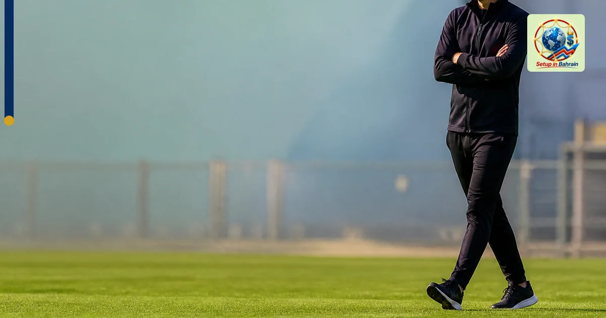 An unbranded editorial cover scene showing a solitary football figure in a training area with a pale green-to-blue background